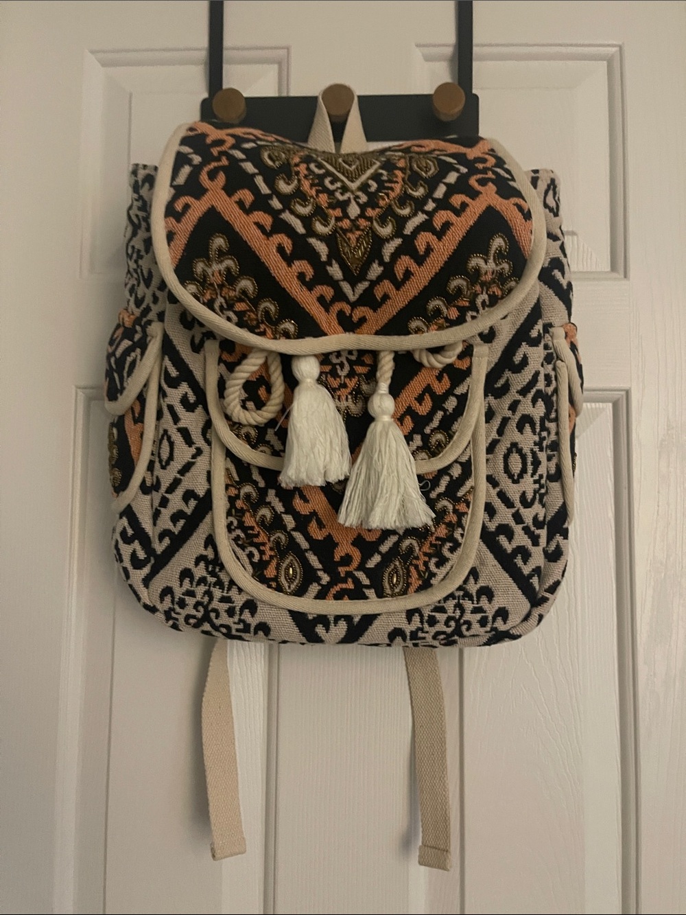 Boho Tassel Drawstring Backpack in Black, Peach & Cream